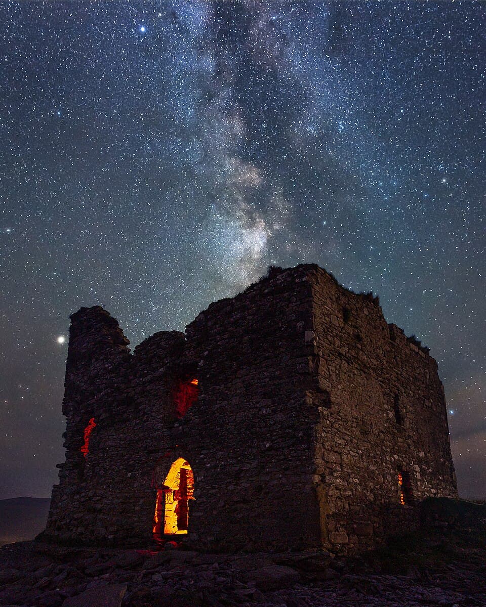 McCarthy's Castle beneath a starry sky in the Kerry Dark Sky Reserve.