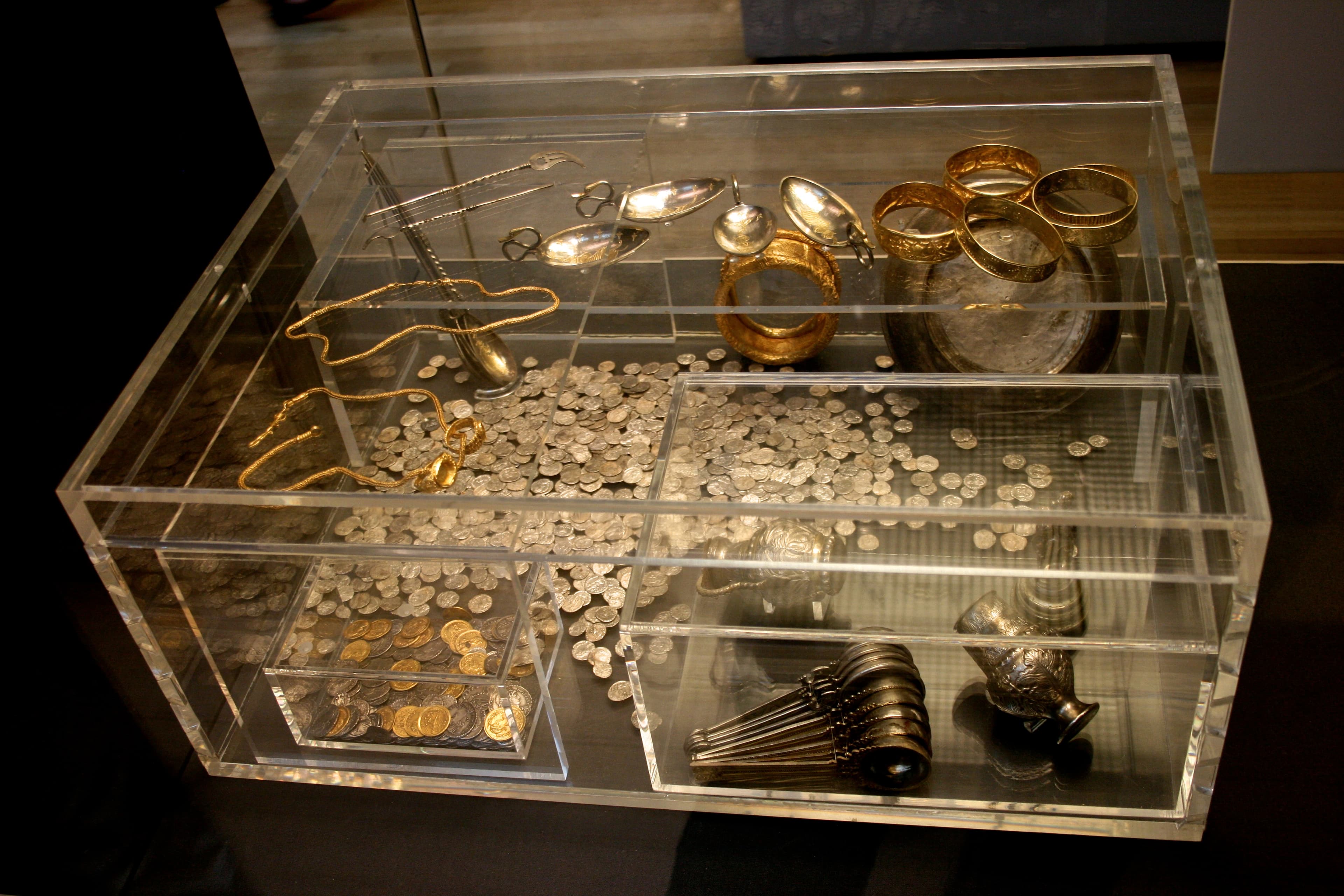 Gold and silver objects from the Hoxne Hoard displayed at the British Museum.