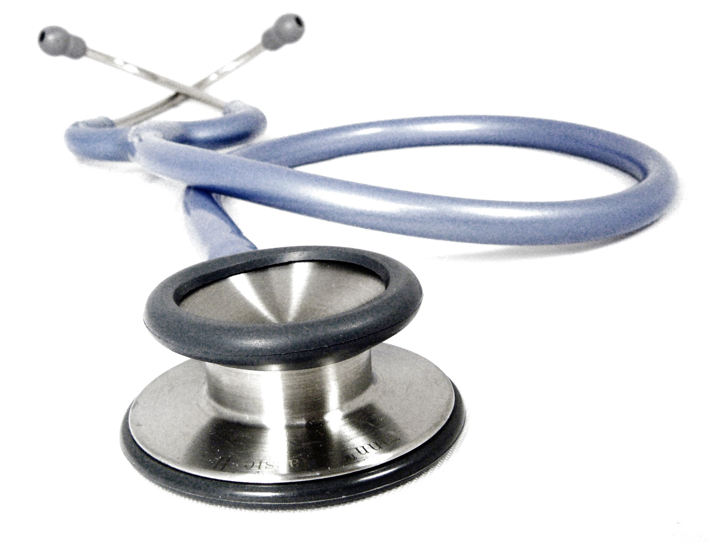 A medical stethoscope on a neutral background