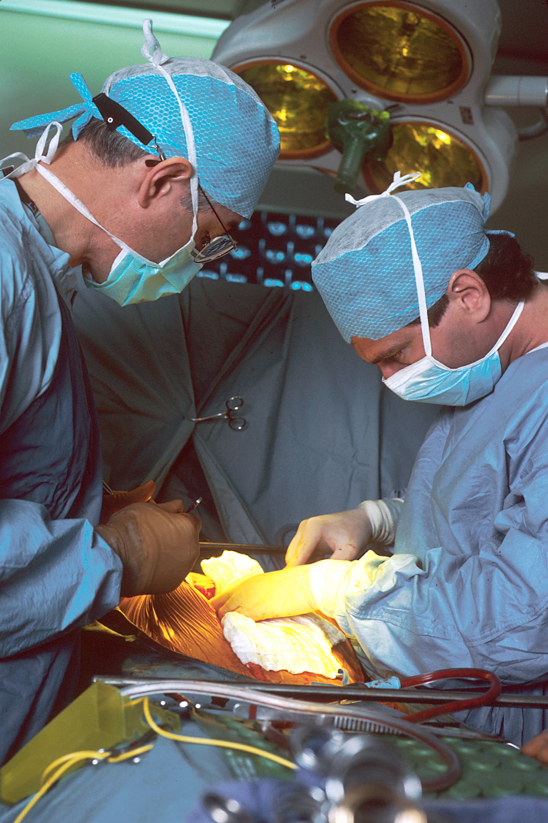 A surgical team working together in an operating room.