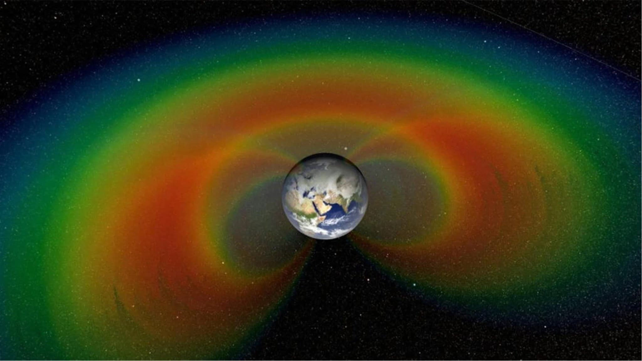 NASA visualization of colorful Van Allen radiation belts surrounding Earth.